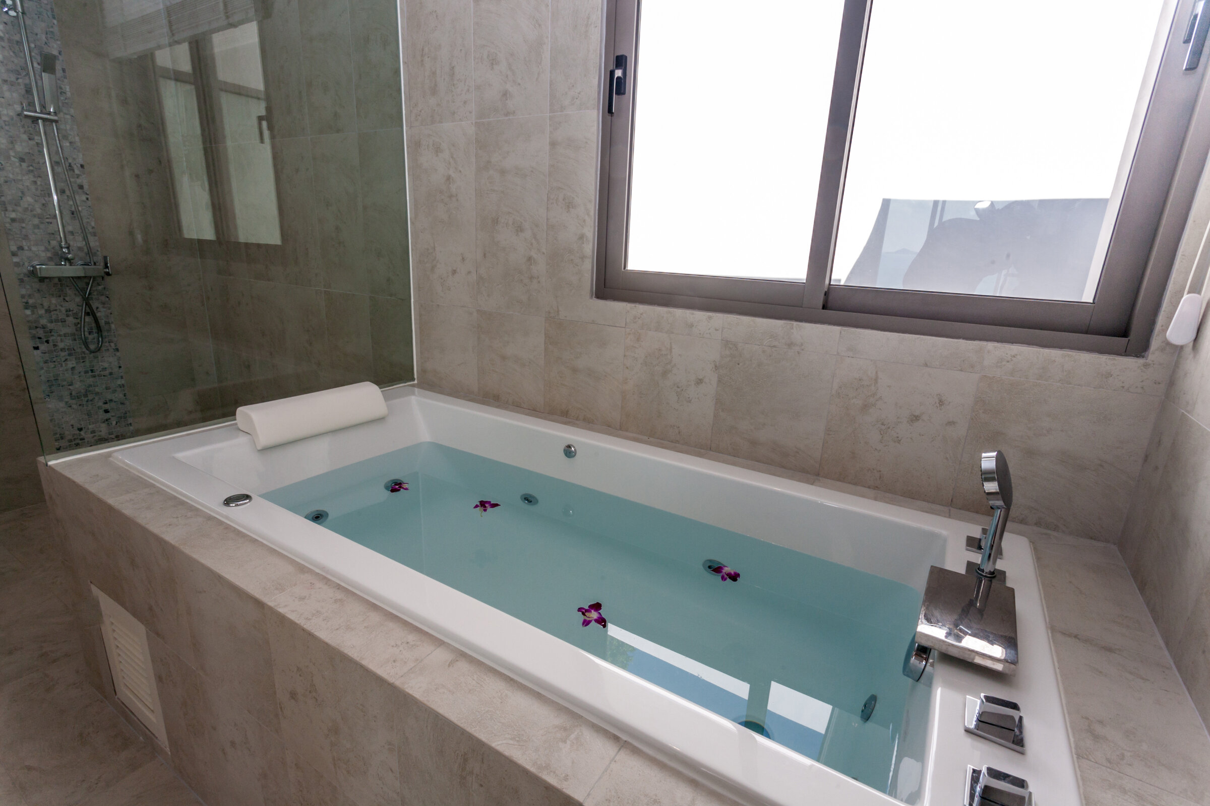 Villa Daizo bathroom with modern shower, sink and mirror